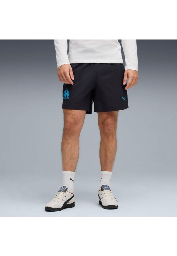 Puma - Tkanina OM Woven 2025/26. Kolor: niebieski. Materiał: tkanina. Sport: piłka nożna