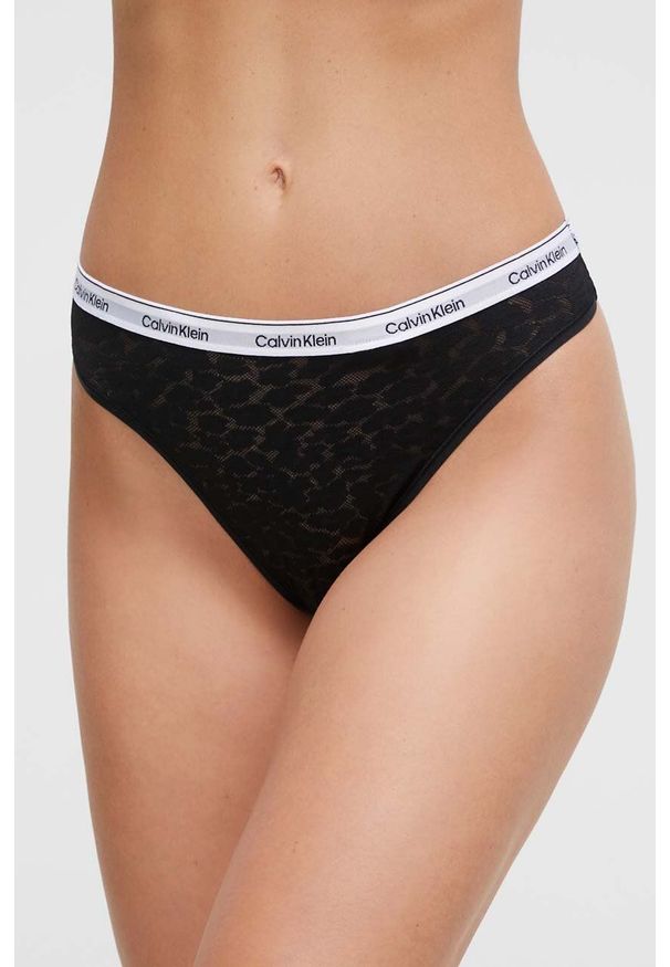 Calvin Klein Underwear stringi kolor czarny z koronki. Kolor: czarny. Materiał: koronka. Wzór: koronka