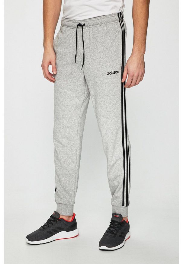 Adidas - adidas - Spodnie. Kolor: szary. Materiał: dzianina