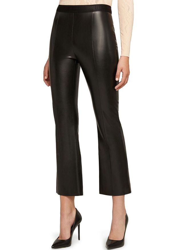 Wolford Spodnie Jenna damskie kolor czarny szerokie high waist. Stan: podwyższony. Kolor: czarny