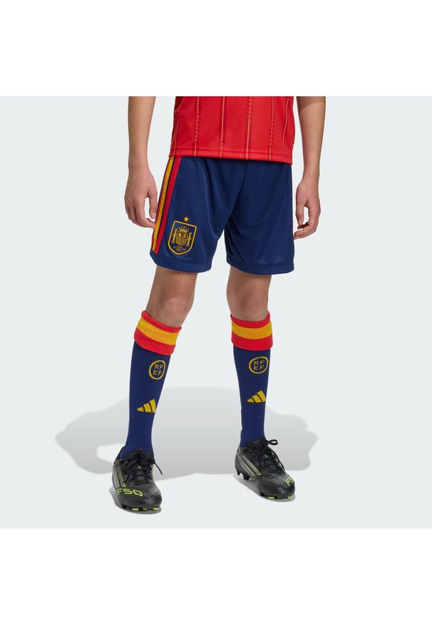 Adidas - Szorty Spain 26 Home Kids. Kolor: niebieski. Technologia: ClimaCool (Adidas). Sport: piłka nożna