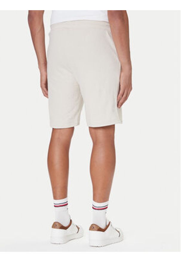 TOMMY HILFIGER - Tommy Hilfiger Szorty sportowe UM0UM03452 Écru Relaxed Fit. Materiał: bawełna. Styl: sportowy