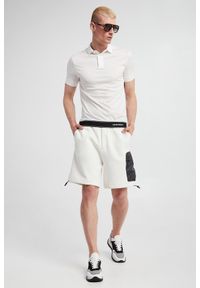 Emporio Armani - Polo męskie EMPORIO ARMANI. Typ kołnierza: polo