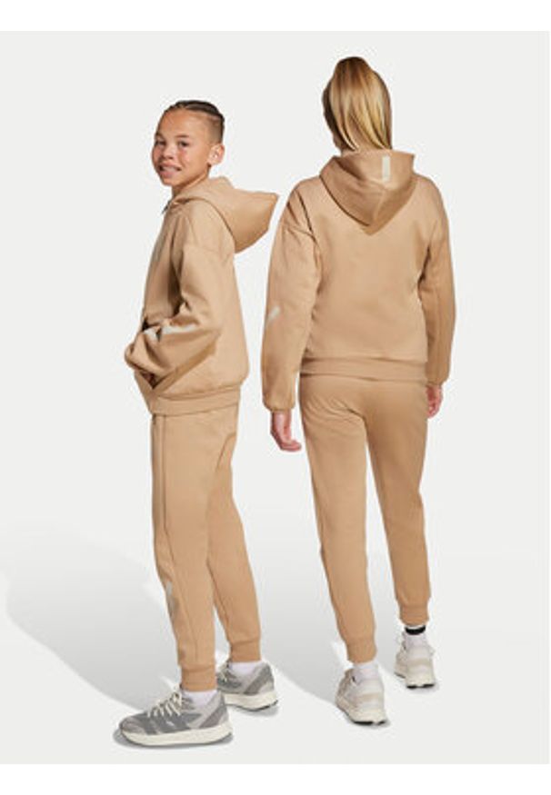 Adidas - adidas Spodnie dresowe Z.N.E. JW4002 Beżowy Tapered Leg. Kolor: beżowy. Materiał: bawełna