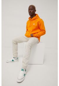 adidas Originals bluza HG3901 męska kolor pomarańczowy z kapturem gładka. Okazja: na co dzień. Typ kołnierza: kaptur. Kolor: pomarańczowy. Materiał: bawełna. Wzór: gładki. Styl: casual