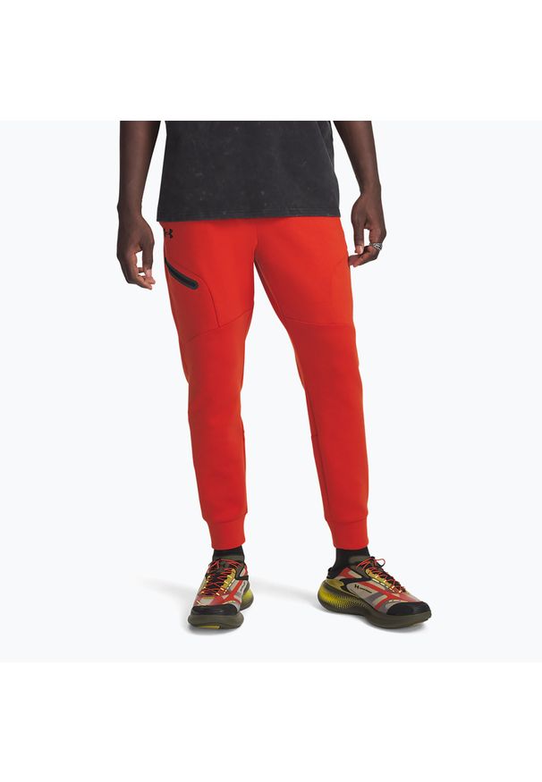 Spodnie treningowe Under Armour Unstoppable Fleece Jgr. Kolor: pomarańczowy. Sport: fitness