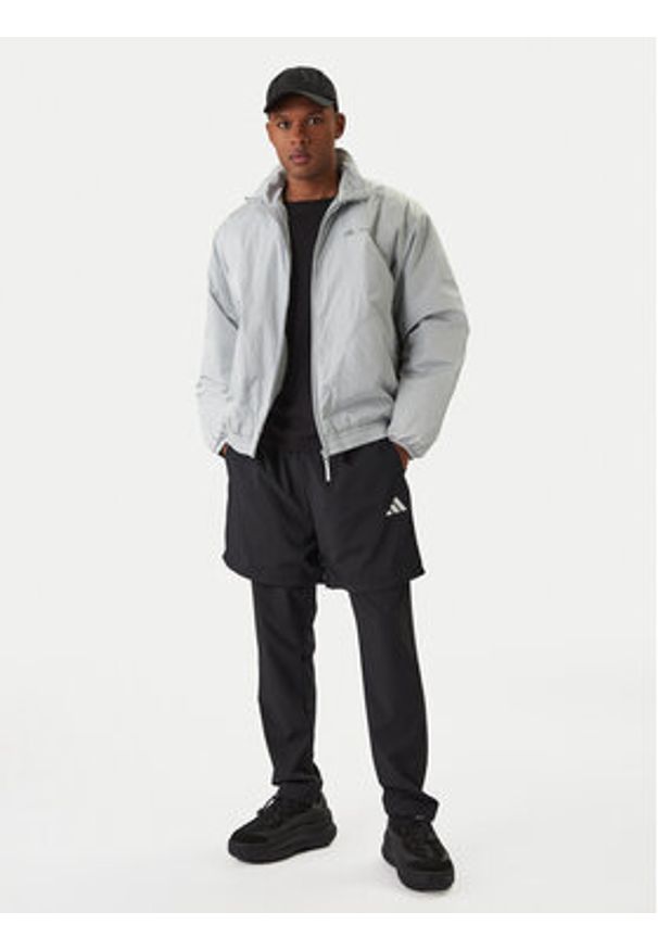 Adidas - adidas Kurtka przejściowa Moon Boot JM8923 Szary Loose Fit. Kolor: szary. Materiał: syntetyk