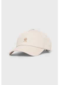 TOMMY HILFIGER - Tommy Hilfiger czapka z daszkiem bawełniana kolor beżowy gładka. Kolor: beżowy. Materiał: bawełna. Wzór: gładki