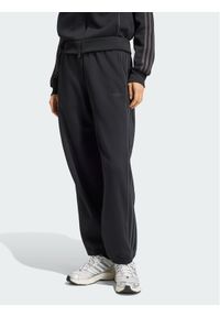 Adidas - adidas Spodnie dresowe 164782 Czarny Loose Fit. Kolor: czarny. Materiał: dresówka #1