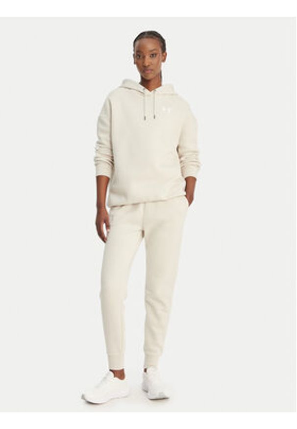 Under Armour Spodnie dresowe UA Icon Fleece 6001537 Beżowy Slim Fit. Kolor: beżowy. Materiał: bawełna