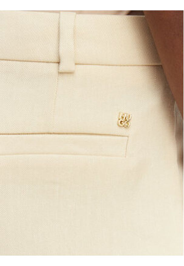Hugo - HUGO Spodnie materiałowe Halati 50559839 Beżowy Regular Fit. Kolor: beżowy. Materiał: wiskoza