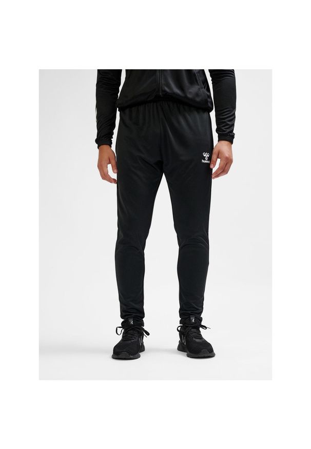Spodnie do biegania Hummel Essential. Kolor: czarny. Materiał: dresówka. Sport: piłka nożna, fitness