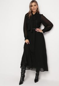 Born2be - Czarna Rozkloszowana Sukienka Maxi z Plisowanym Dołem i Paskiem Brofilla. Okazja: na co dzień. Kolor: czarny. Materiał: poliester, materiał, koronka. Wzór: aplikacja, koronka. Styl: casual, klasyczny. Długość: maxi #6