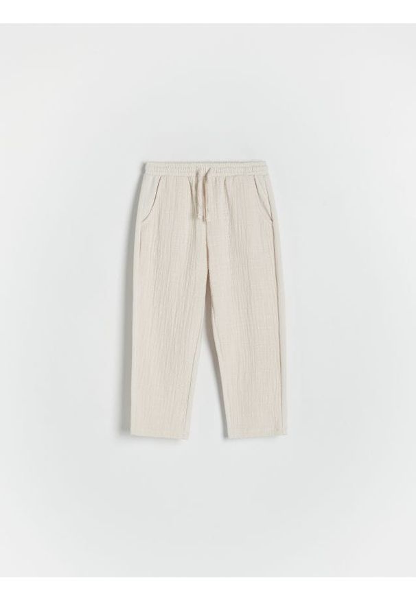 Reserved - Dzianinowe spodnie chino - złamana biel. Materiał: dzianina