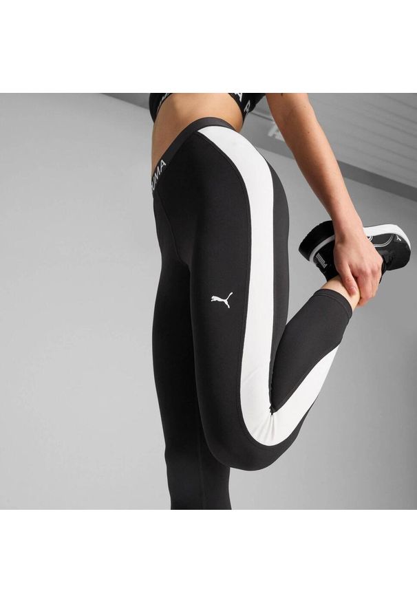 Puma - Damskie legginsy z wysokim stanem i blokami kolorów o długości 7/8 PUMA STRONG. Stan: podwyższony. Kolor: czarny. Wzór: aplikacja. Sport: bieganie, fitness