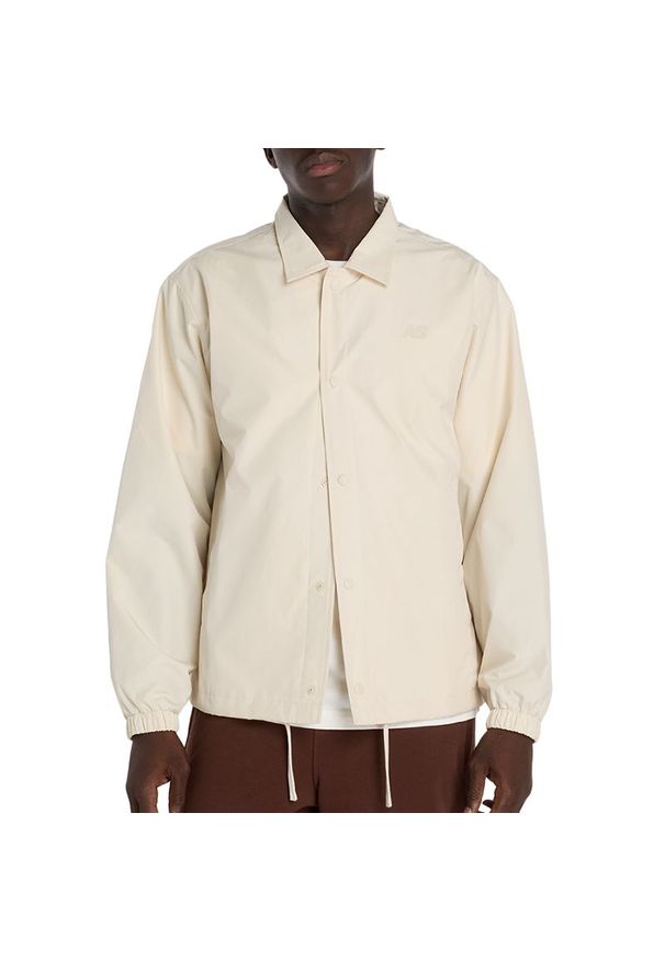 Kurtka męska New Balance MJ61U6AJLIN - beżowa. Kolor: beżowy. Materiał: poliester. Sport: fitness