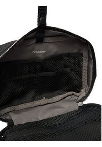 Calvin Klein Kosmetyczka Emblem Aop Washbag LV04D1208G Czarny. Kolor: czarny. Materiał: materiał #2