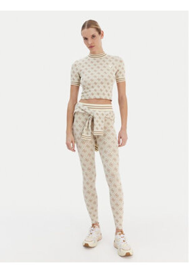 Guess Spodnie materiałowe 179838 Beżowy Slim Fit. Kolor: beżowy. Materiał: syntetyk