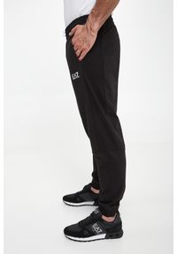 EA7 Emporio Armani - Spodnie dresowe męskie EA7 EMPORIO ARMANI. Materiał: dresówka