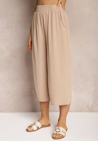 Renee - Ciemnobeżowe Spodnie Palazzo z Gumką w Talii i Długością Nogawki 3/4 Moolia. Kolekcja: plus size. Kolor: beżowy. Materiał: materiał #5