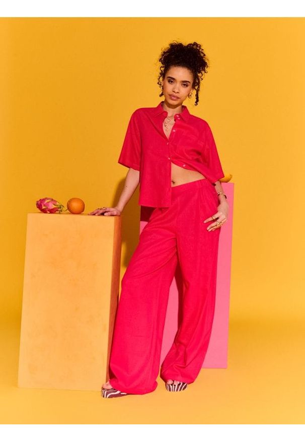 Sinsay - Spodnie wide leg z domieszką lnu - różowy. Kolor: różowy. Materiał: len