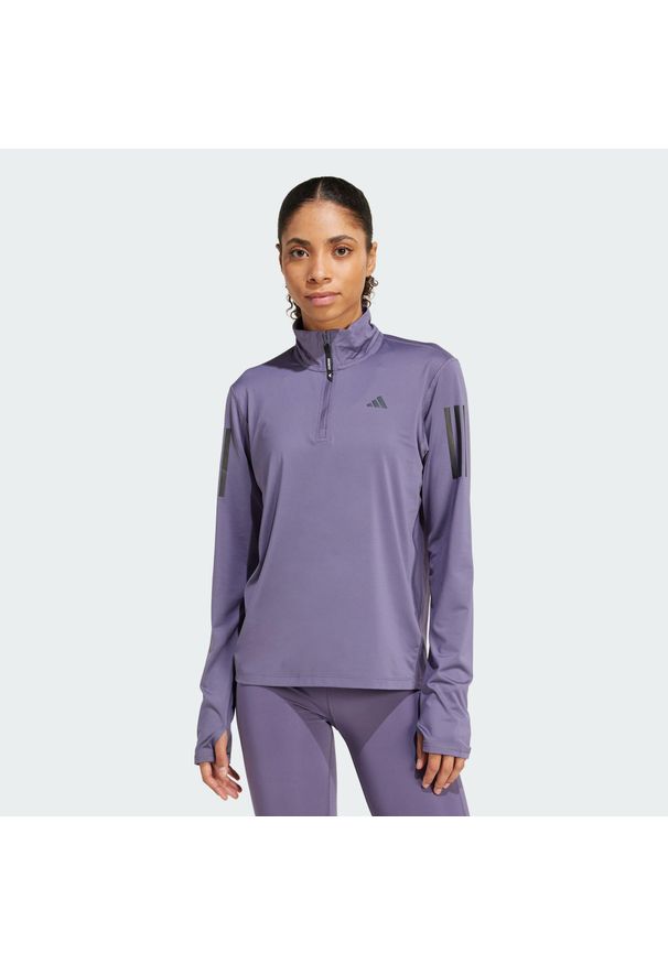 Adidas - Kurtka Own the Run Half-Zip. Kolor: fioletowy. Materiał: materiał. Sport: bieganie