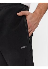 BOSS - Boss Spodnie dresowe Hadiko 1 50504752 Czarny Regular Fit. Kolor: czarny. Materiał: bawełna, syntetyk