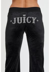 Juicy Couture - JUICY COUTURE Czarne spodnie Rodeo Layla. Kolor: czarny. Materiał: dresówka