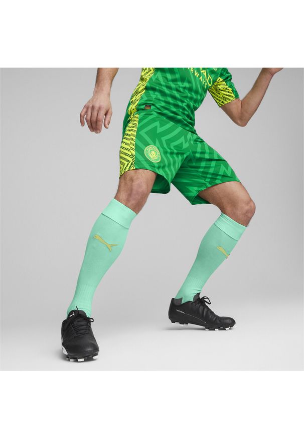 Puma - Szorty bramkarskie Manchester City PUMA Grassy Green Yellow Alert. Kolor: zielony, wielokolorowy, żółty. Sport: piłka nożna