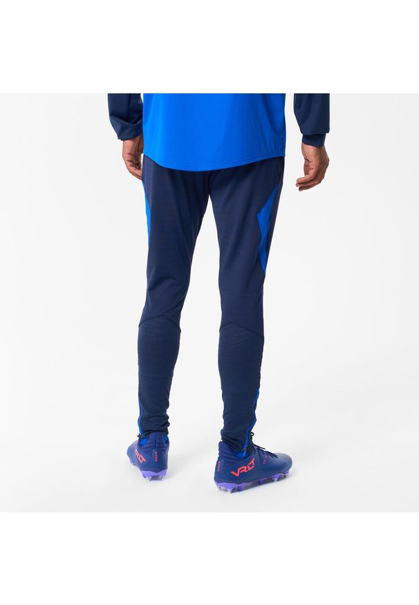 KIPSTA - Spodnie piłkarskie Kipsta CLR. Kolor: niebieski. Materiał: skóra, materiał. Sport: piłka nożna