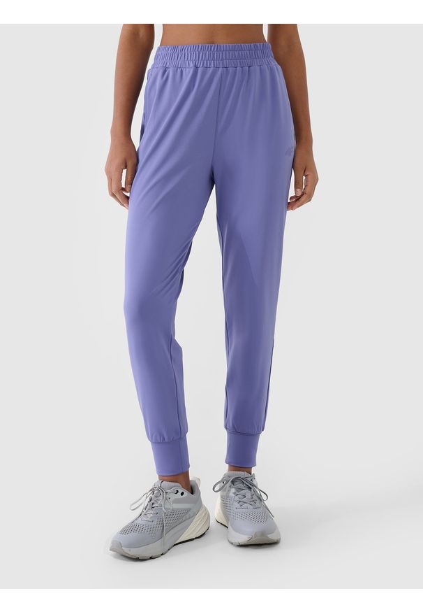 4f - 4F Spodnie treningowe szybkoschnące damskie - granatowe XXL. Kolor: niebieski. Materiał: syntetyk, włókno, dzianina, materiał, elastan. Wzór: jednolity, ze splotem. Sport: fitness