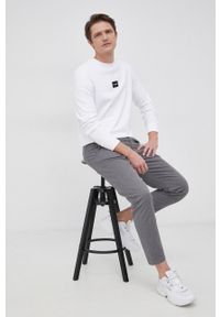 Calvin Klein - Bluza bawełniana. Okazja: na co dzień. Kolor: biały. Materiał: bawełna. Wzór: gładki. Styl: casual