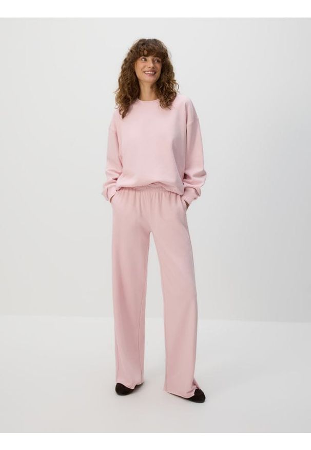 Reserved - Spodnie dresowe - pastelowy róż. Kolor: różowy. Materiał: dresówka