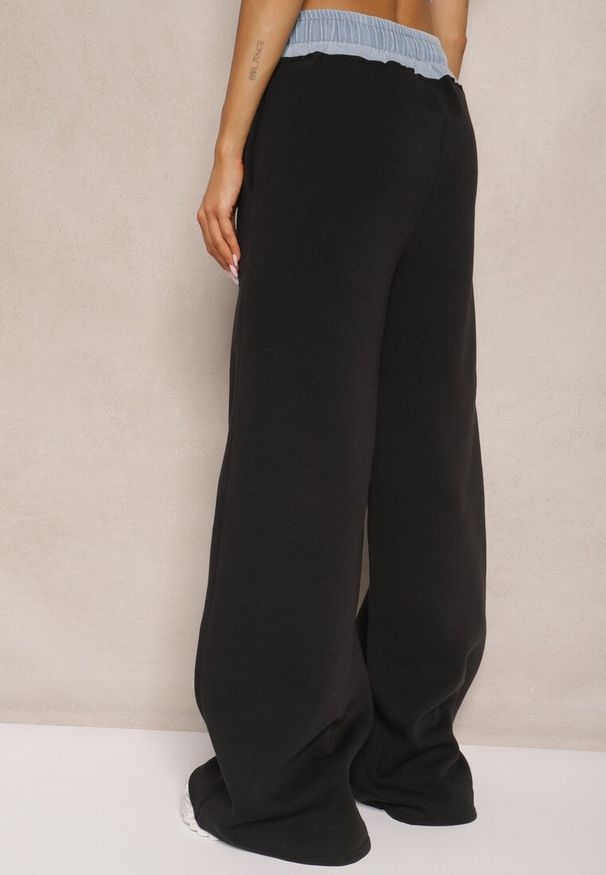 Renee - Czarno-Niebieskie Spodnie z Bawełną o Szerokim Kroju High Waist Ozdobione Sznurkami Annoriel. Okazja: na co dzień. Stan: podwyższony. Kolor: czarny. Materiał: bawełna. Długość: krótkie. Wzór: aplikacja. Styl: casual, elegancki