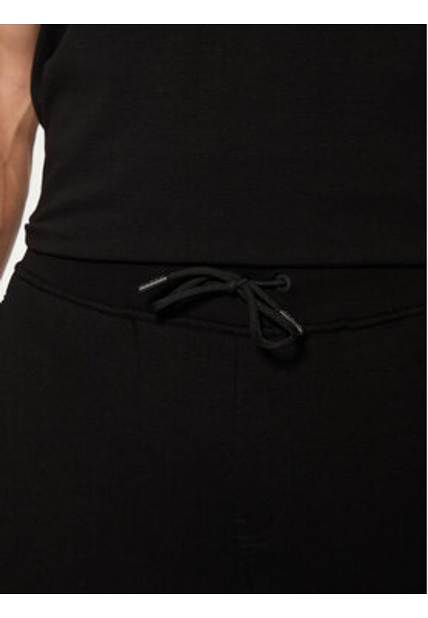 Guess Spodnie dresowe Z4YB08 K9V31 Czarny Regular Fit. Kolor: czarny. Materiał: bawełna