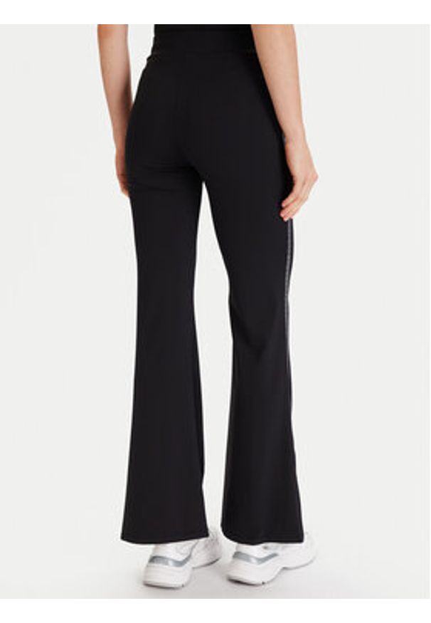 MICHAEL Michael Kors Legginsy MF530W51RE Czarny Flare Fit. Kolor: czarny. Materiał: syntetyk