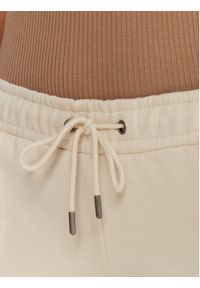 Guess Jeans Spodnie dresowe W5BB04 KC811 Beżowy Wide Leg. Kolor: beżowy. Materiał: bawełna #2