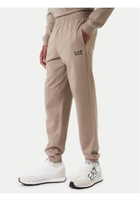 EA7 Emporio Armani Spodnie dresowe 8NPP66 PJVRZ U6167 Beżowy Regular Fit. Kolor: beżowy. Materiał: bawełna #1