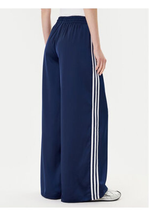Adidas - adidas Spodnie dresowe adicolor Satin JD0881 Granatowy Wide Leg. Kolor: niebieski. Materiał: syntetyk