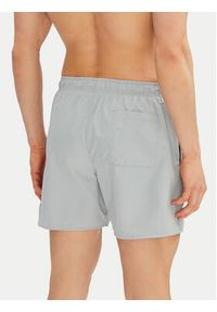 Calvin Klein Swimwear Szorty kąpielowe KM0KM01101 Niebieski Regular Fit. Kolor: niebieski. Materiał: syntetyk