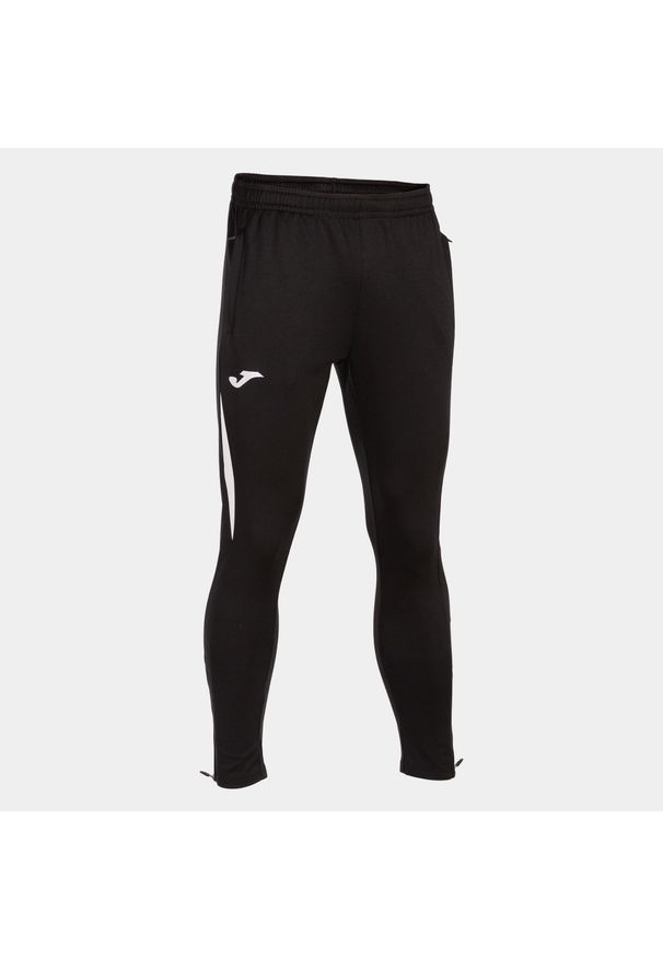 Spodnie sportowe dresowe męskie Joma Championship VII z kieszeniami. Kolor: czarny, biały, wielokolorowy. Materiał: dresówka. Długość: długie. Sport: piłka nożna