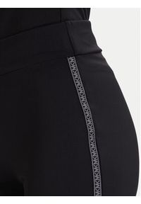 MICHAEL Michael Kors Legginsy MF530W51RE Czarny Flare Fit. Kolor: czarny. Materiał: syntetyk #2