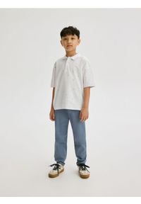 Reserved - Spodnie chino regular fit - granatowy. Kolor: niebieski. Materiał: tkanina, bawełna