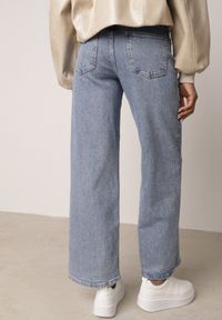 Born2be - Niebieskie Jeansy o Szerokim Kroju z Lyocellem Bawełną i Wysokim Stanem Onisea. Okazja: na co dzień. Stan: podwyższony. Kolor: niebieski. Długość: długie. Styl: casual, elegancki, klasyczny #6