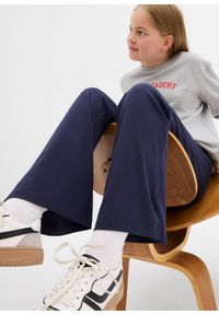 bonprix - Spodnie z poszerzaną nogawką z mieszanki bawełny organicznej z rozcięciami po bokach. Kolor: niebieski. Materiał: bawełna #3