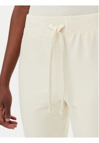 Champion Spodnie dresowe 118101 Écru Slim Fit. Materiał: bawełna #4