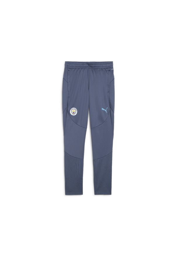 Puma - Młodzieżowe spodnie treningowe Manchester City PUMA Inky Blue Magic. Kolor: niebieski. Sport: piłka nożna