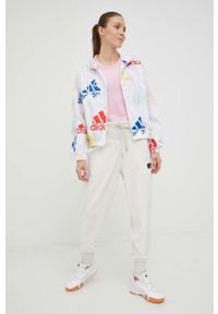 Adidas - adidas spodnie dresowe damskie kolor beżowy. Kolor: beżowy. Materiał: dresówka #4