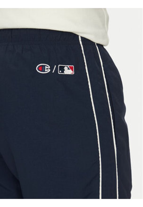Champion Komplet dresowy 221238 Granatowy Regular Fit. Kolor: niebieski. Materiał: syntetyk