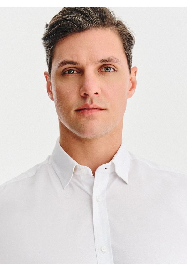 Pako Lorente - PAKO LORENTE – Biała bawełniana koszula męska. Kolor: niebieski, biały, czarny. Materiał: bawełna. Długość rękawa: długi rękaw. Długość: długie. Wzór: gładki